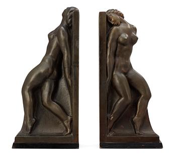 526. A pair of Axel Gute patinated bronze bookends, Sweden 1920's.