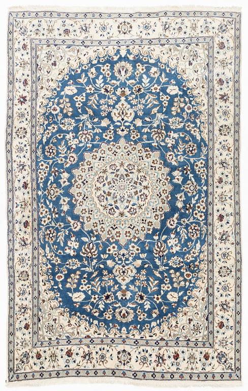 A Nain carpet, circa 310 x 196 cm.