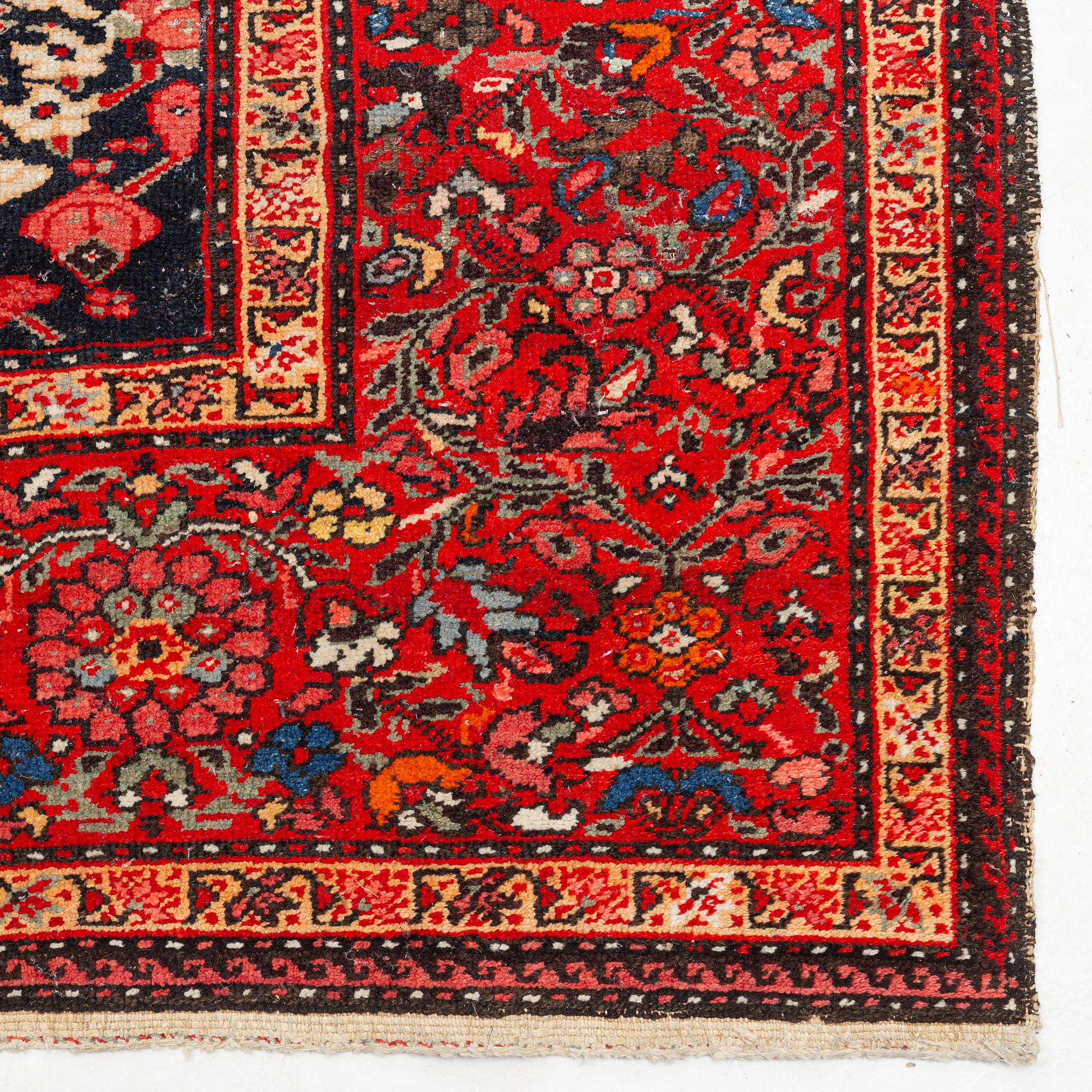A Farahan carpet, c. 520 x 205 cm.
