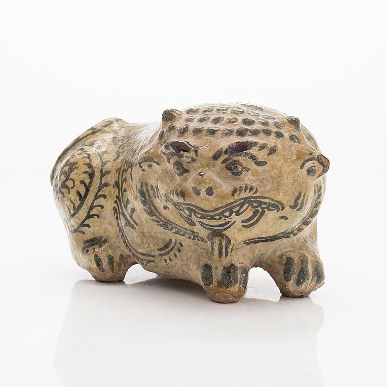 A ceramic animal figure, possibly Sawankhalok, Thailand 16th/17th century.