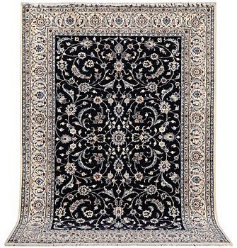 A carpet, Nain, part silk, 9 laa, c.295 x 197 cm.