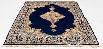 An old Kerman rug, ca. 249 x 148 cm.