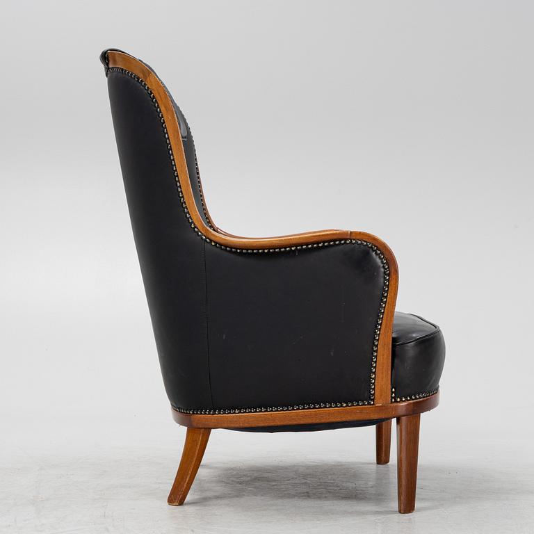Carl Malmsten, a mahogany 'Advokaten' armchair.