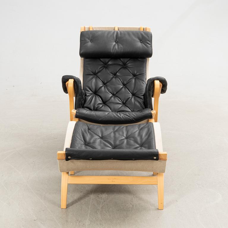 Bruno Mathsson, fåtölj med fotpall, "Pernilla", Dux.