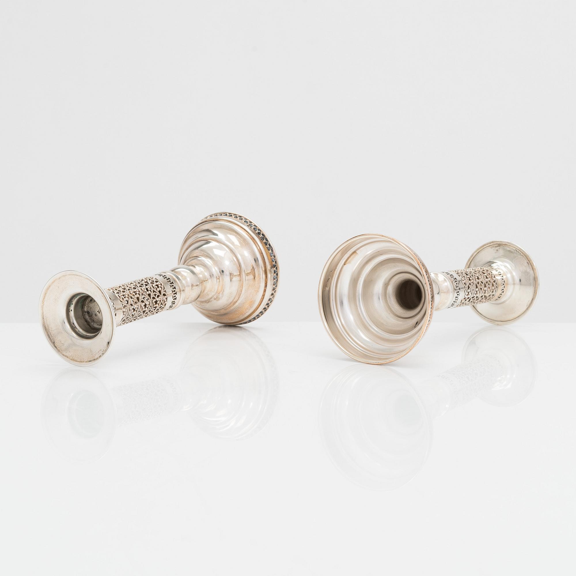 A pair of sterling silver candlesticks, latter half of the 20th century. Unidentified maker's mark.