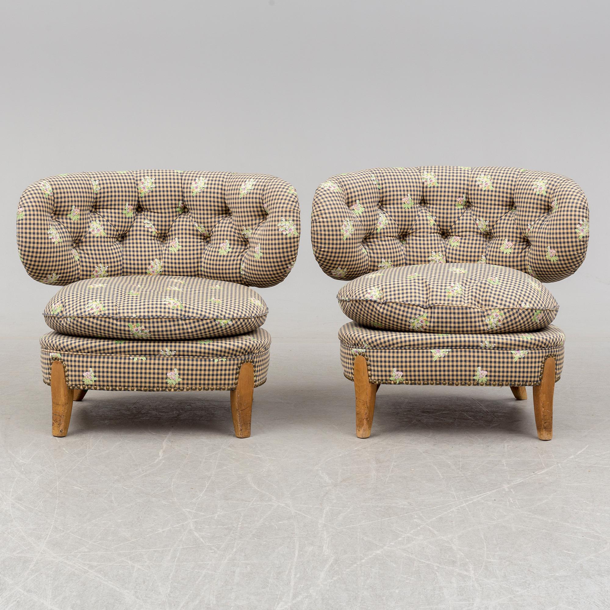 A pair of armchairs, designed by Otto Schultz, mid 20th century.