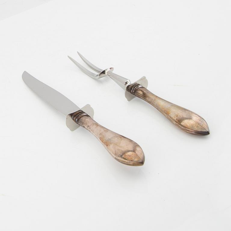 Cartier, carving knife in silver-plated metal, second half of the 20th century.