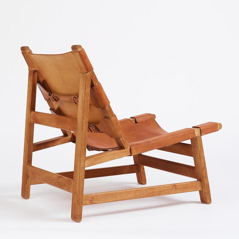 Børge Mogensen, an oak and natural brown leather easy chair model "2224", Fredericia Stolefabrik, Denmark, 1960s.