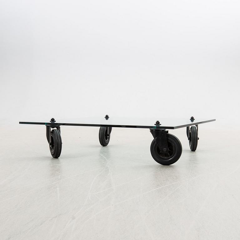 Gae Aulenti, coffee table, "Table with Wheels", Fontana Arte, Italy late 20th century/early 21st century.