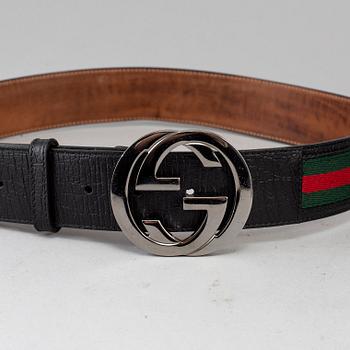 GUCCI, a belt + a calendar case.