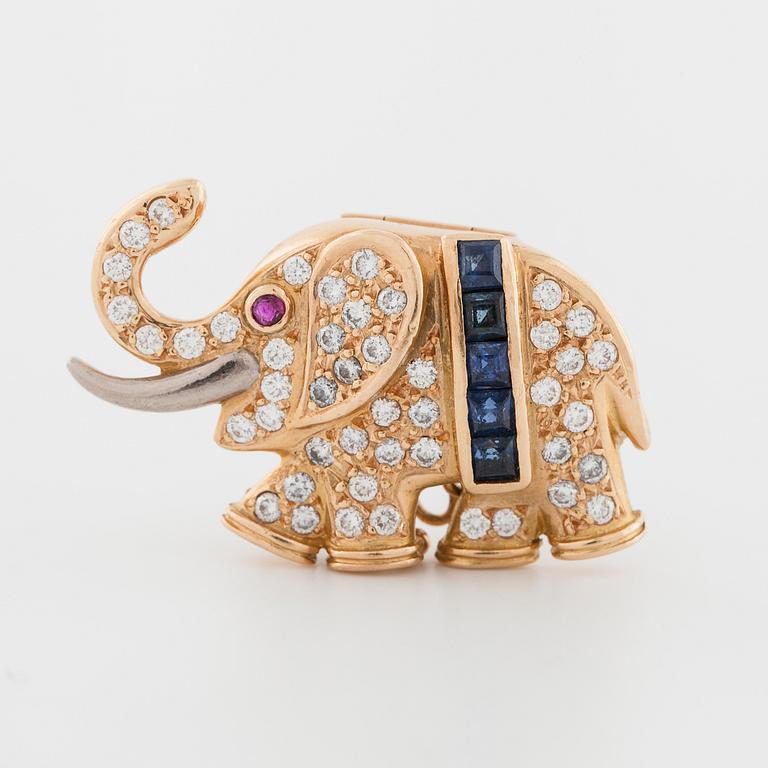 JARL SANDIN, Göteborg, 1993, ett spänne med rubin, safirer samt briljantslipade diamanter.