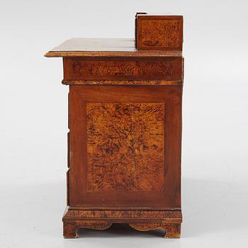 A Swedish late Baroque alder-veneered 'knee-hole' writing desk, first part of the 18th century.