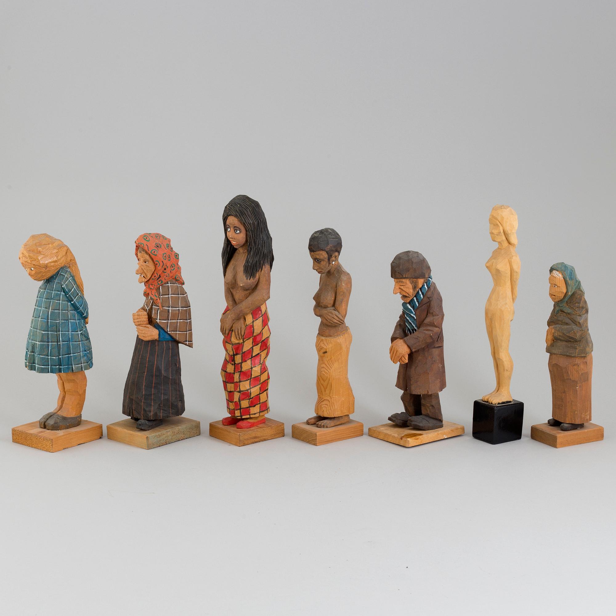 TRÄFIGURER, 7 st, signerade EK. Flertalet daterade 1969. (1 skulptur ej signerad).
