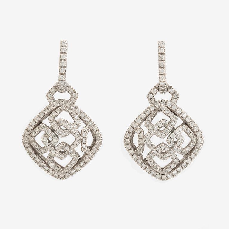 18K white gold and brilliant cut diamond earrings.