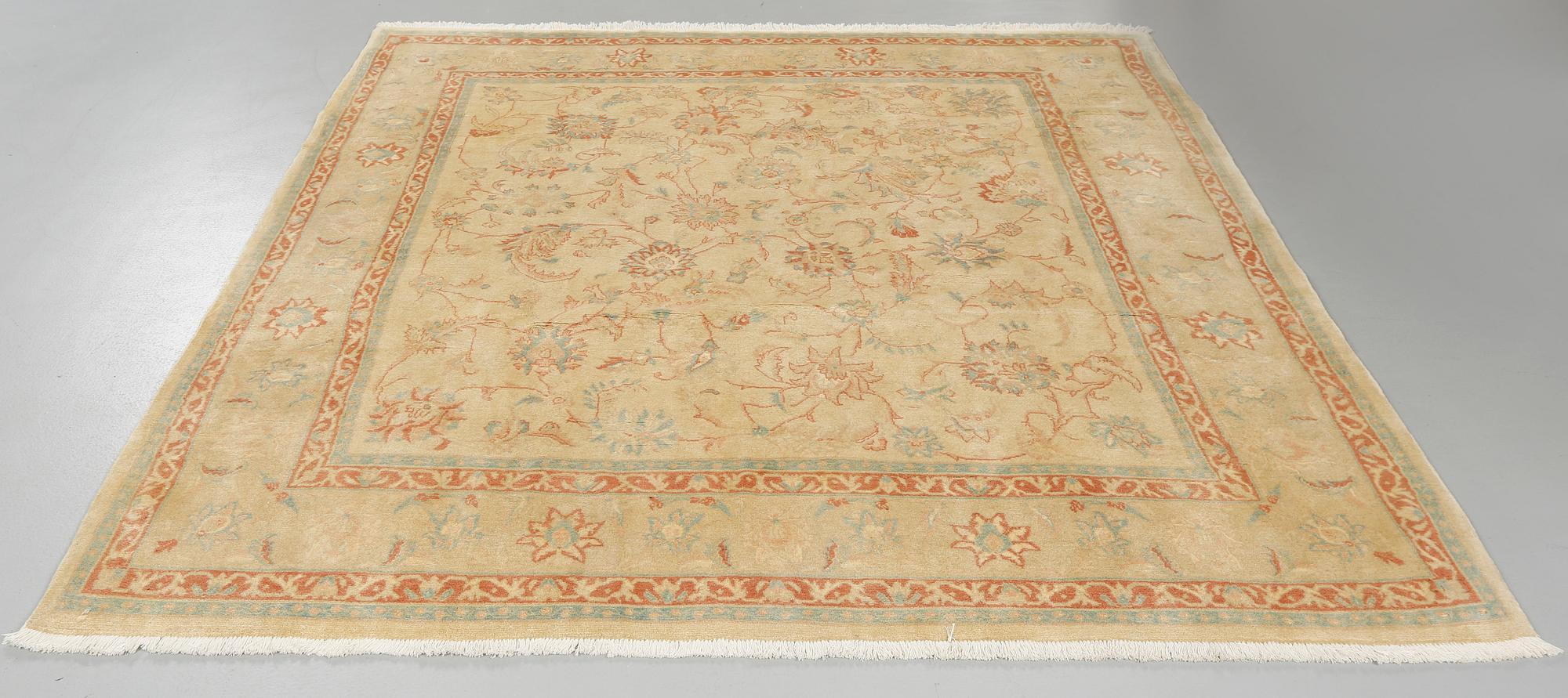 A Ziegler design rug, 230 x 221 cm.