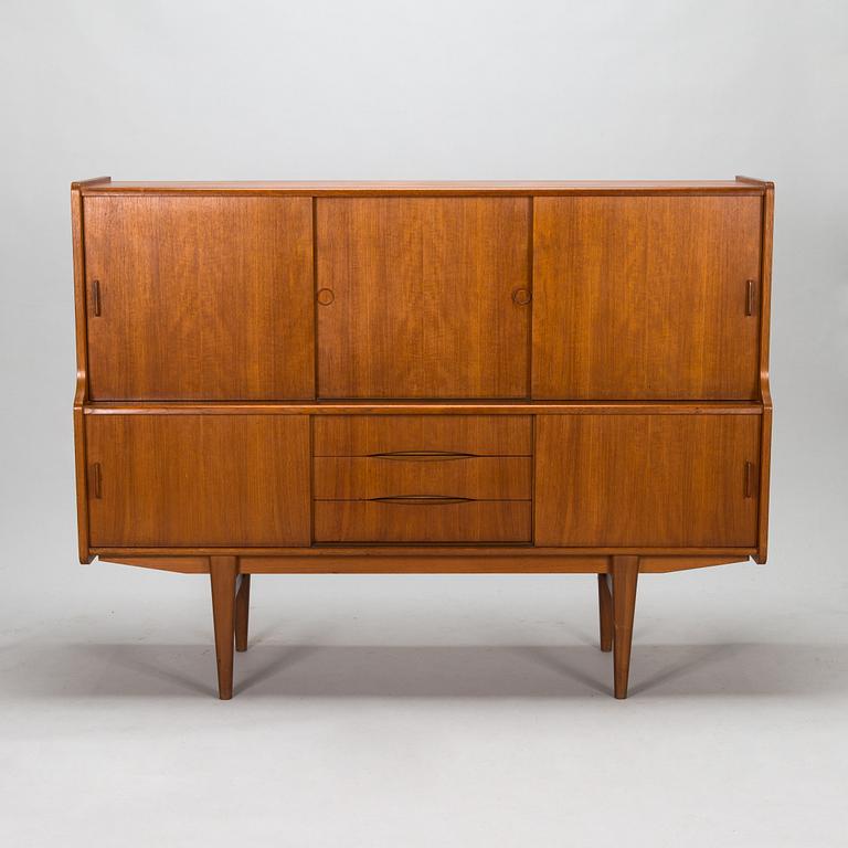 A Danish 1950s-60s cabinet with bar compartment.