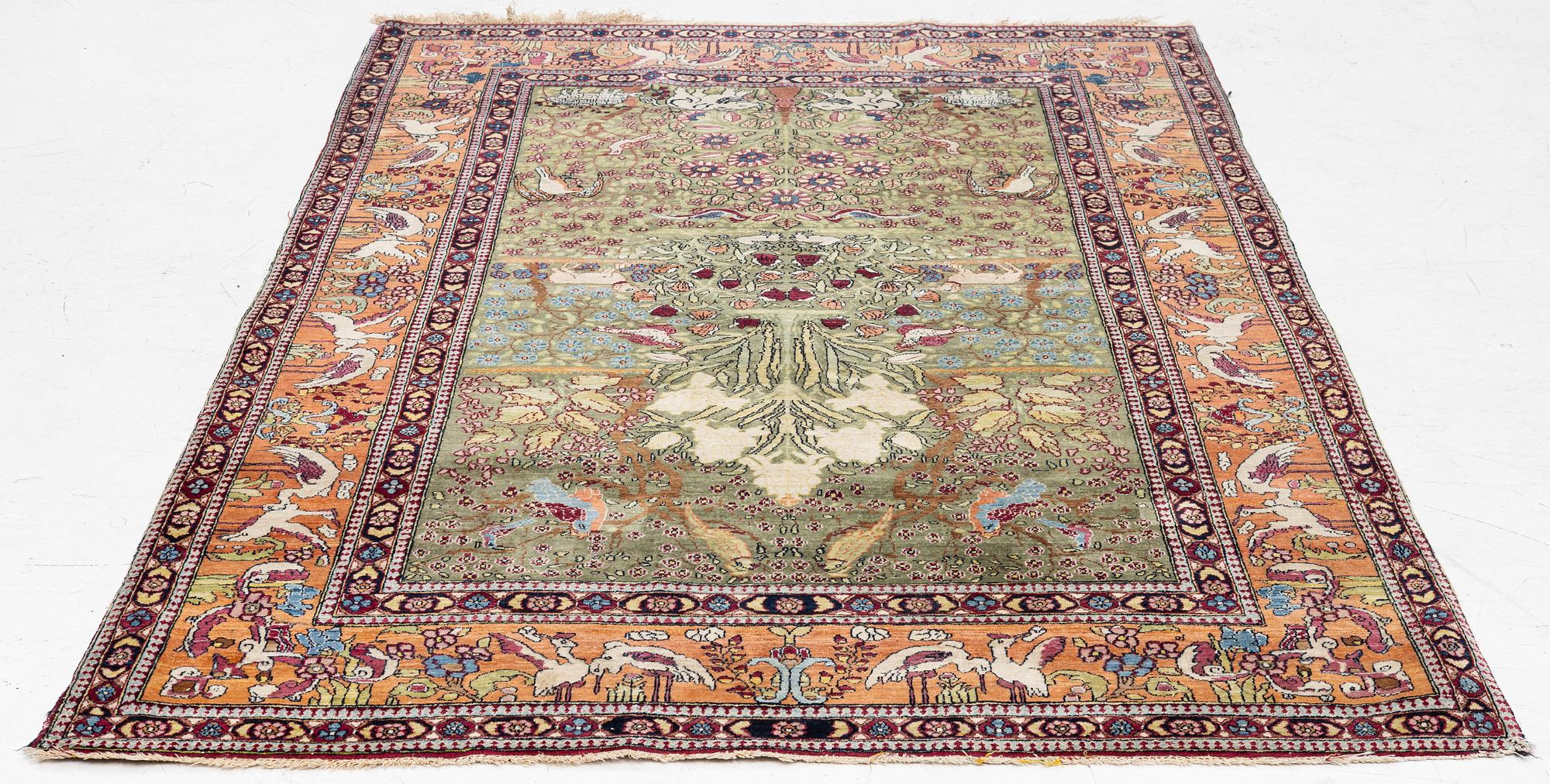 An antique Mobarekeh rug, central Persia, c. 230 x 130 cm.