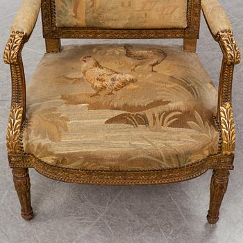 A late 19th century Louis XVI-style armchair.