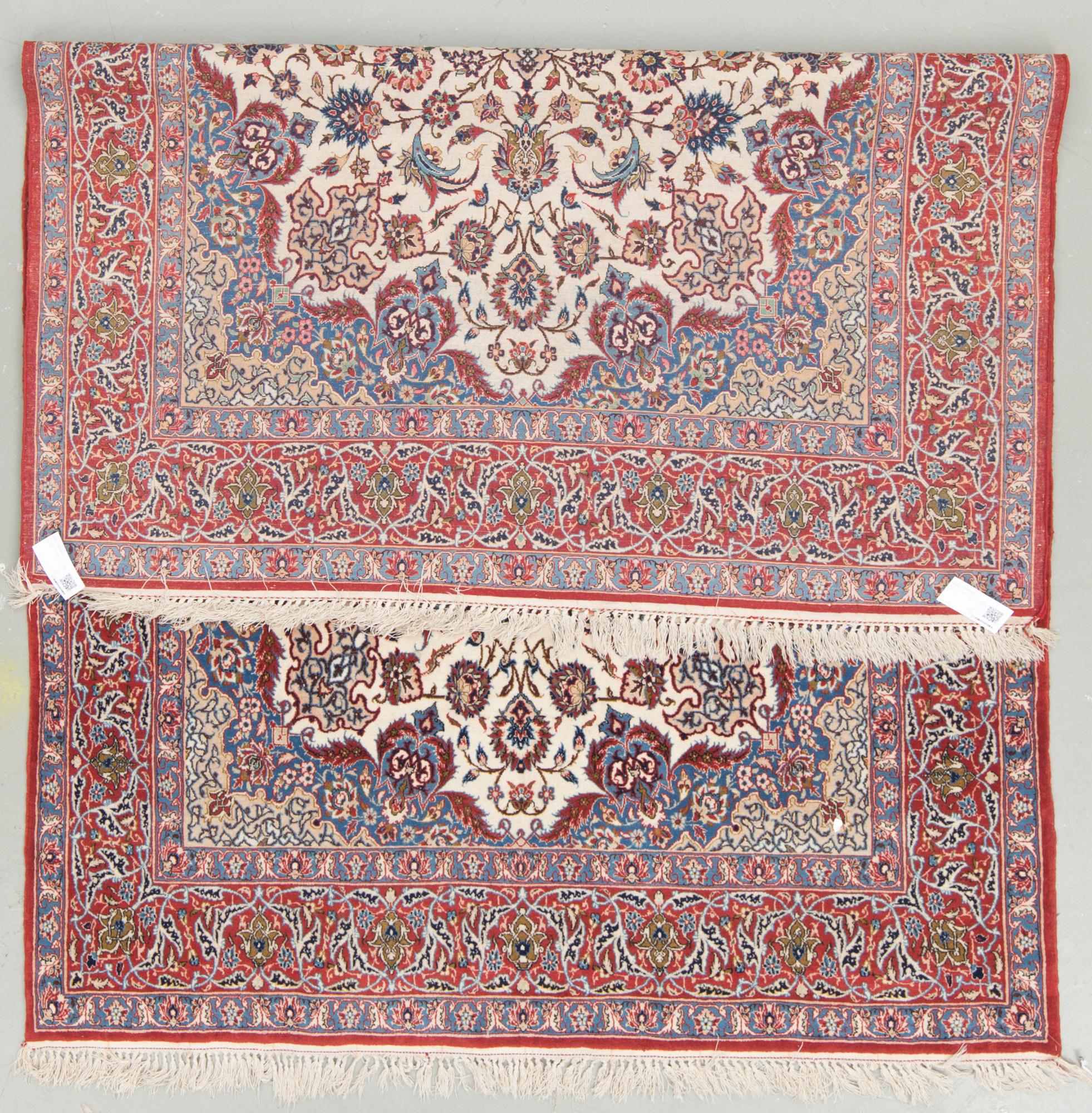 An old Esfahan carpet, around 222 x 144 cm.