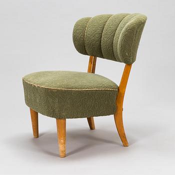 Lisa Johansson-Pape, a 1940's armchair for  Keravan Puusepäntehdas, Stockmann.