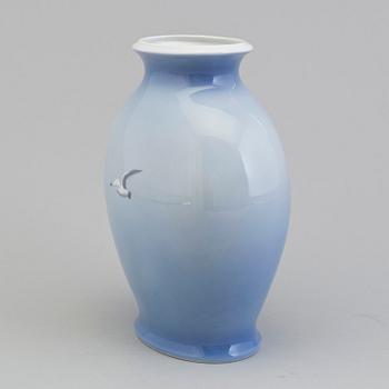 A porcelain vase by ROYAL COPENHAGEN.