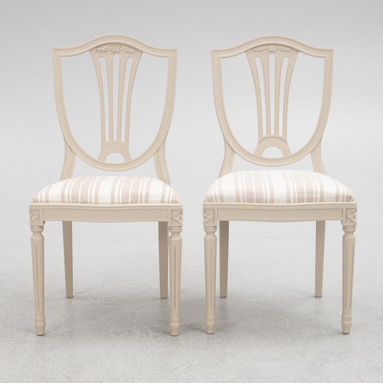 A Gustavian Style Dining Table and 10 Chairs, second half of the 20th Century.