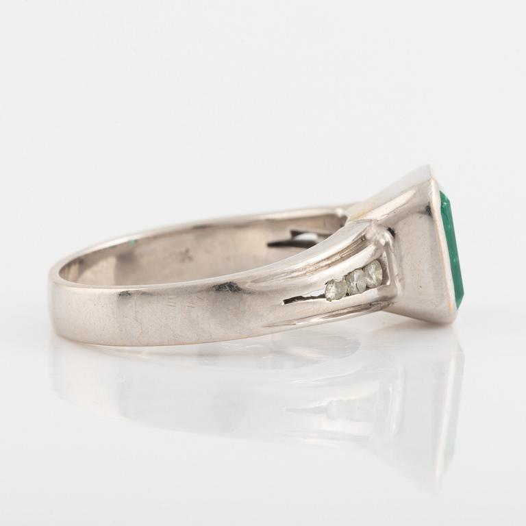 Emeralt cut emerald and brilliant cut diamond ring.