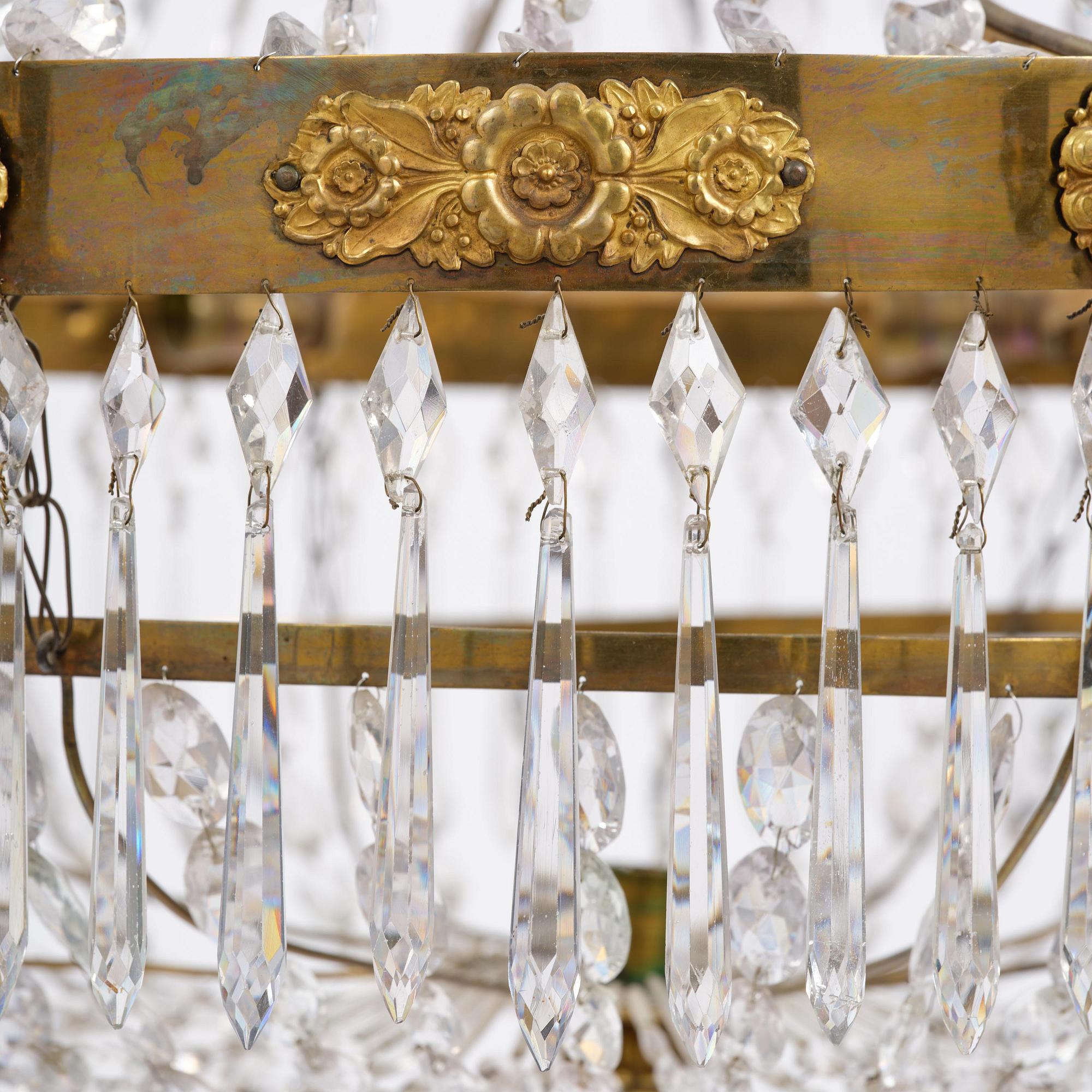 A Swedish late Empire gilt brass nine-light chandelier, 1830's.