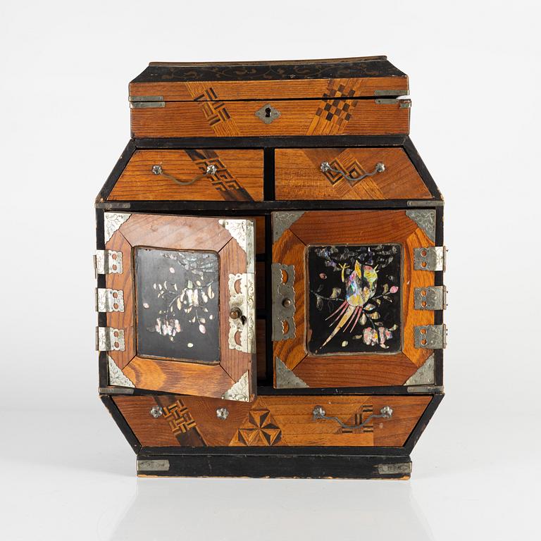 A Japanese miniature chest, early 20th Century.