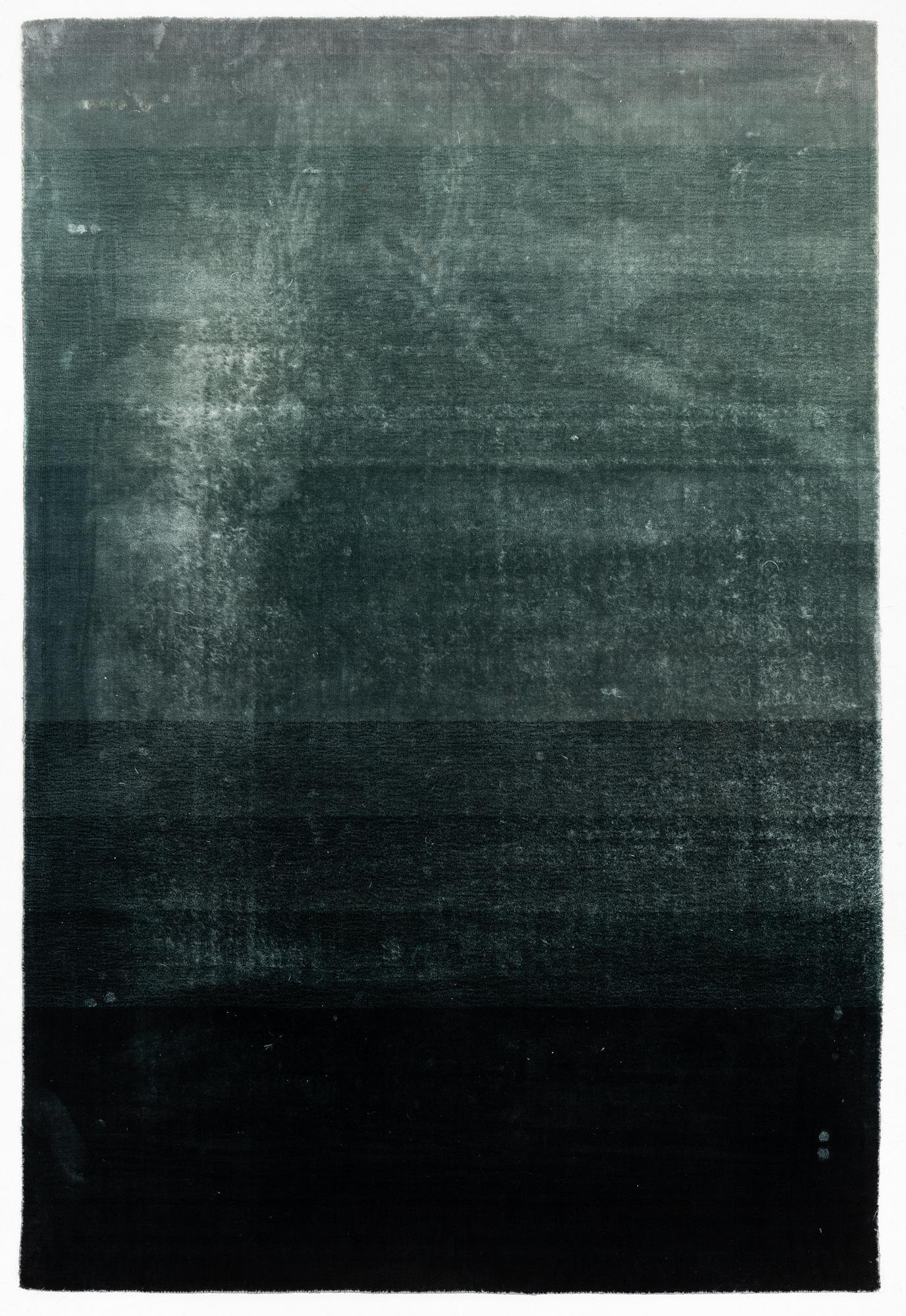 A Designers Guild carpet 'Capisoli teal', ca 205 x 300 cm.