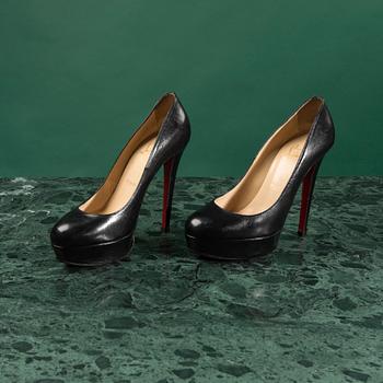 A pair of shoes by CHRISTIAN LOUBOUTIN, in size 36,5.