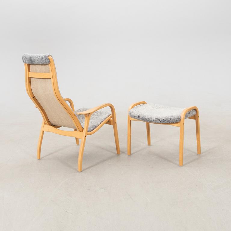 Yngve Ekström, armchair with footstool "Lamino", Swedese 20th century.