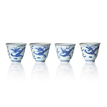 1310. A set of four blue and white dragon wine cups, 'Hatcher Cargo', 17th century.