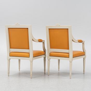 A pair of Gustavian style armchairs, end of the 20th Century.