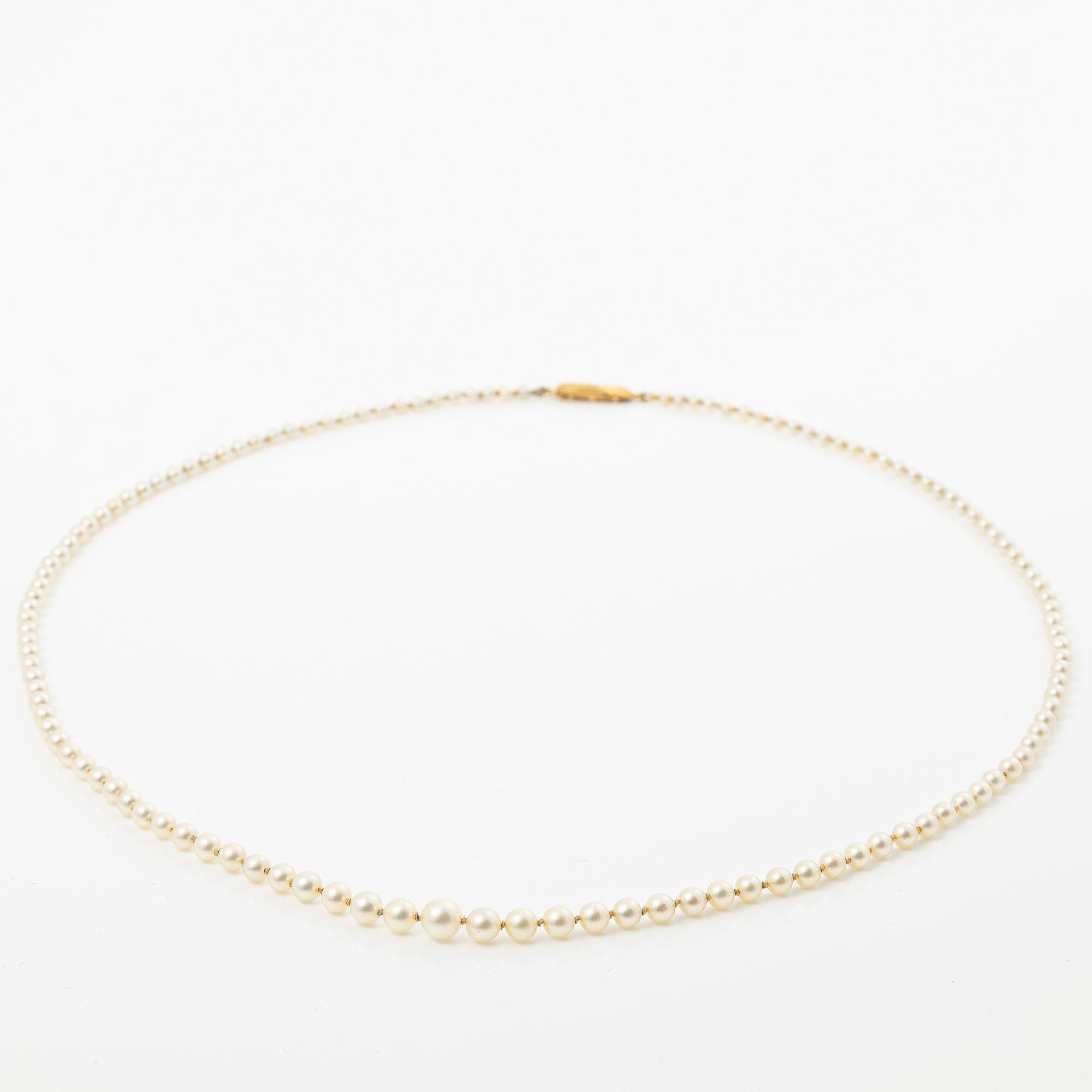 Collier odlade pärlor lås 18K guld.