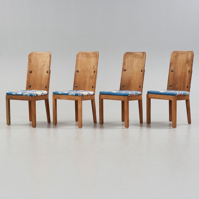 Axel Einar Hjorth, a set of four 'Lovö' stained pine chairs, Nordiska Kompaniet, Sweden 1930's.