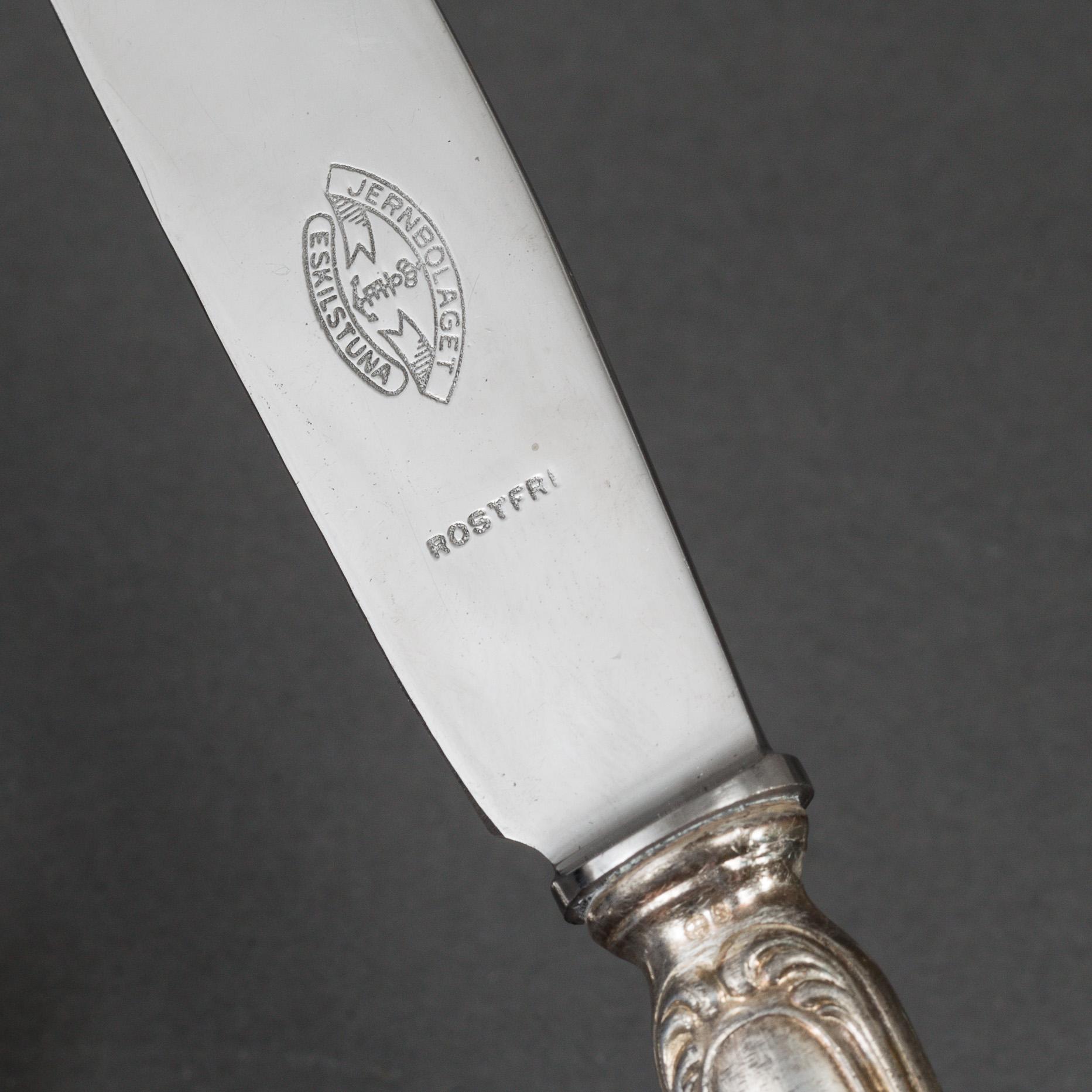 K. ANDERSSON, 12 silver knives, model 'Barock,' Stockholm.
