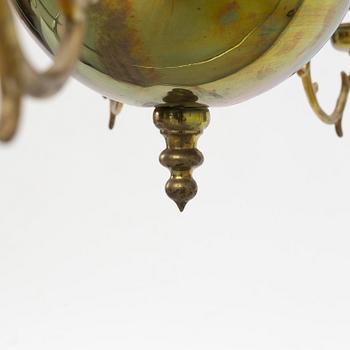 A baroque-style brass eighteen-branch chandelier, late 19th century.