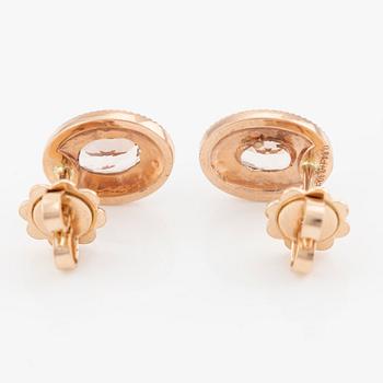 A pair of earrings in 14K rose gold with faceted morganite and round brilliant-cut diamonds.