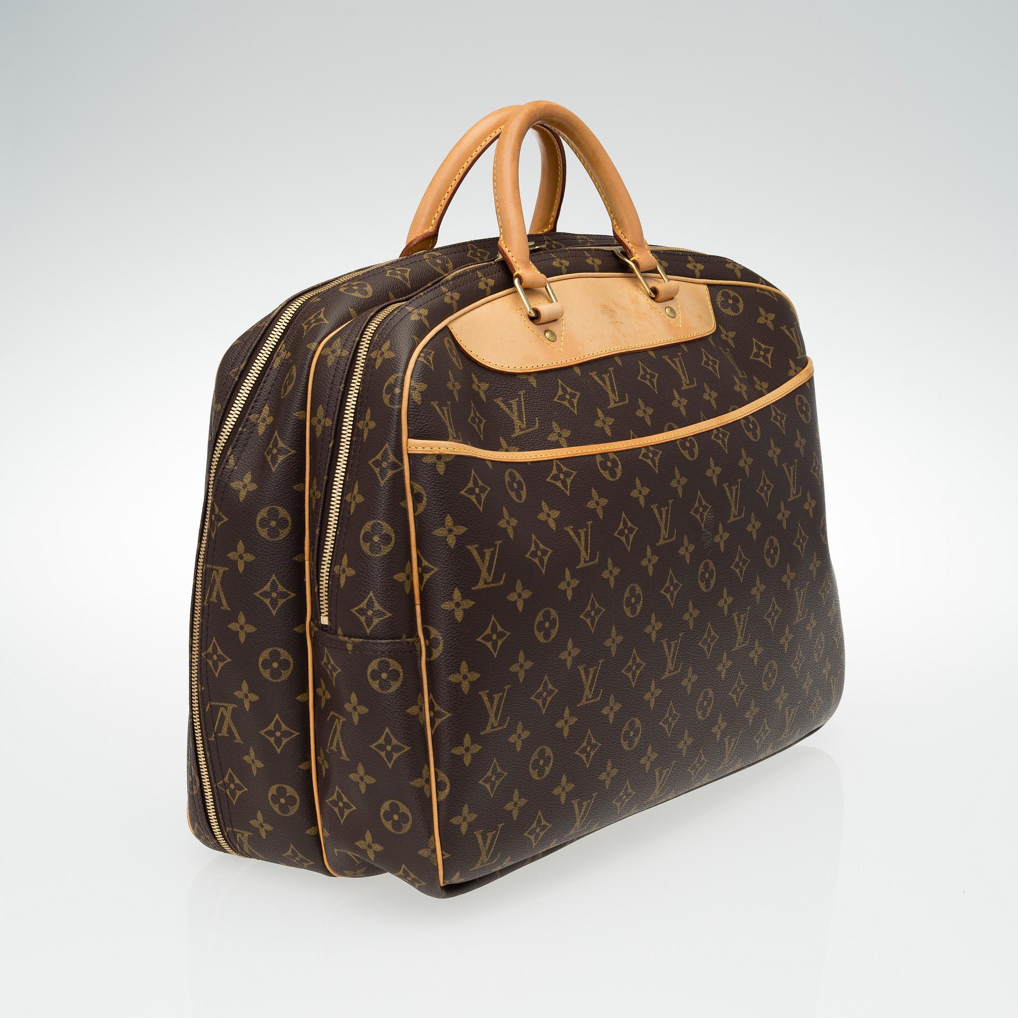A Louis Vuitton, "Alize 24 Heures" Monogram Canvas Travel Bag.