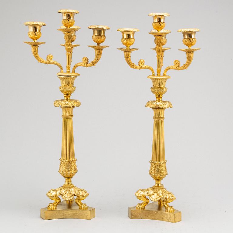 A pair of French Empire style four-light candelabra, second half of the 19th century.