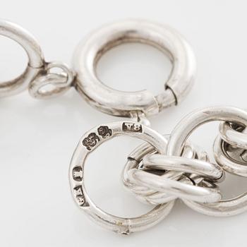 Silver necklace.