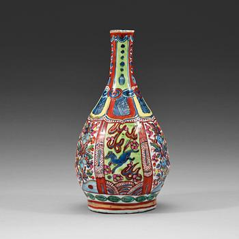 509. A 'clobbered' bottle vase, Ming dynasty, Wanli (1572-1620).