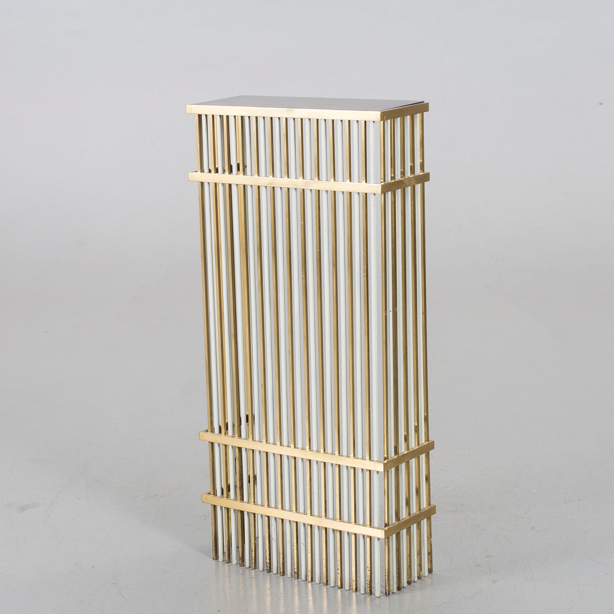 A CONSOLE TABLE/RADIATOR COVER.