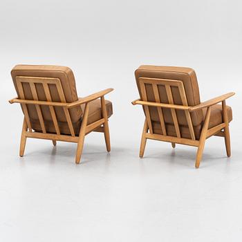Hans J. Wegner, a pair of armchairs, "GE 240/Cigar", Getama, Gedsted, Denmark, 1950s/60s.