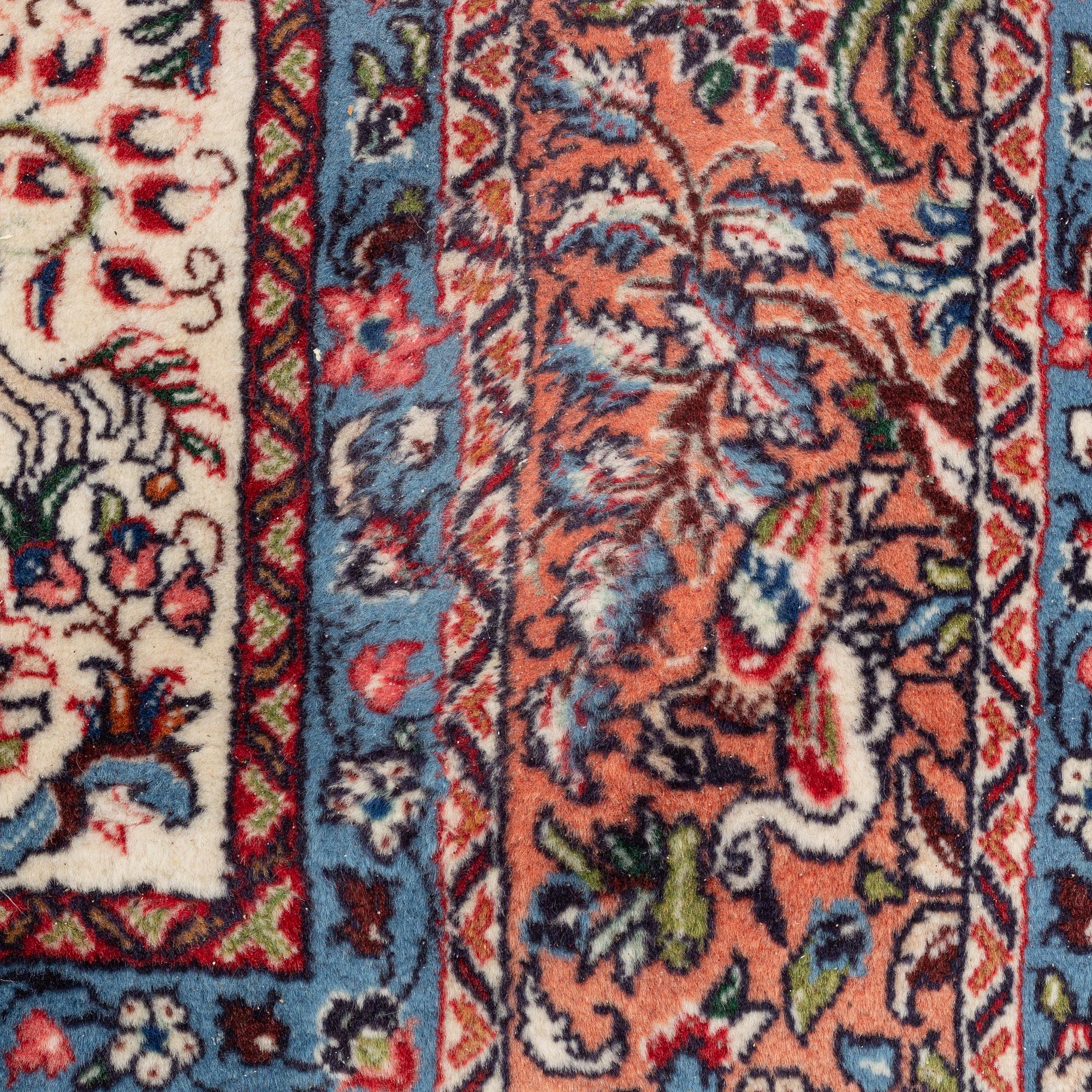 A rug, Kerman, figural, ca 222 x 218 cm.