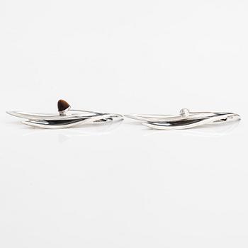 Elis Kauppi, Two silver brooches, one with a tiger's eye. Kupittaan kulta, Turku 1959 and 1962.