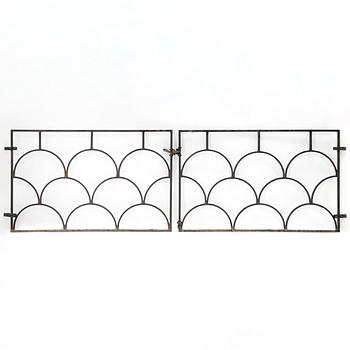 A pair of cast iron gates, 1930's.