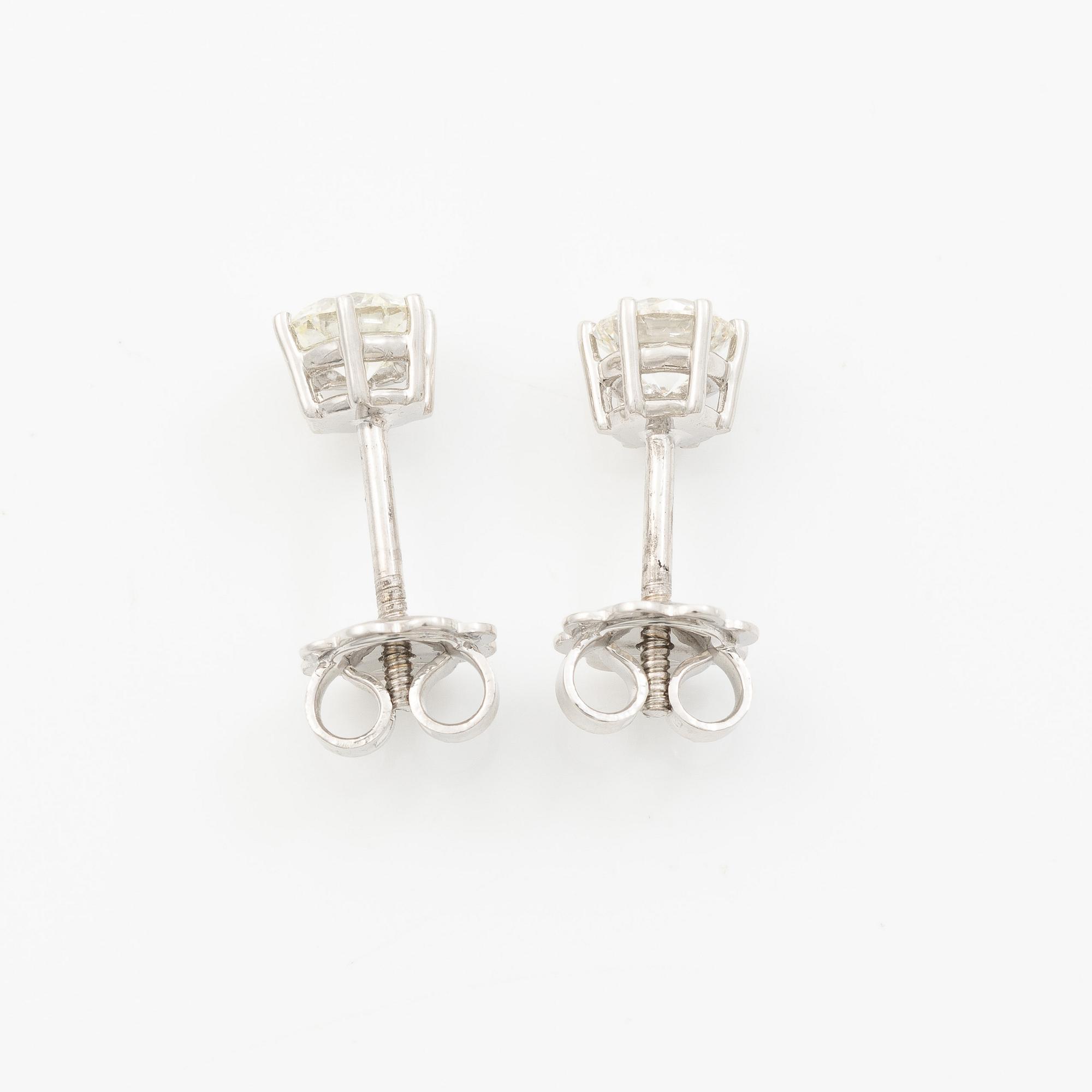 Earrings, single-stone earrings in 18K white gold with brilliant-cut diamonds.