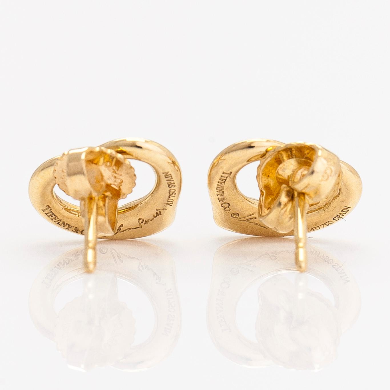 Tiffany & Co, Elsa Peretti, a pair of 18K gold 'Open Heart' earrings.